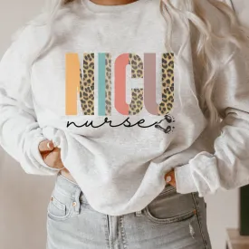 Women's NICU Nurse Crewneck Sweatshirt Winter Neonatal ICU on a Soft, Cozy Pullover Unisex-Size Sweatshirt in White, Sand, or Ash